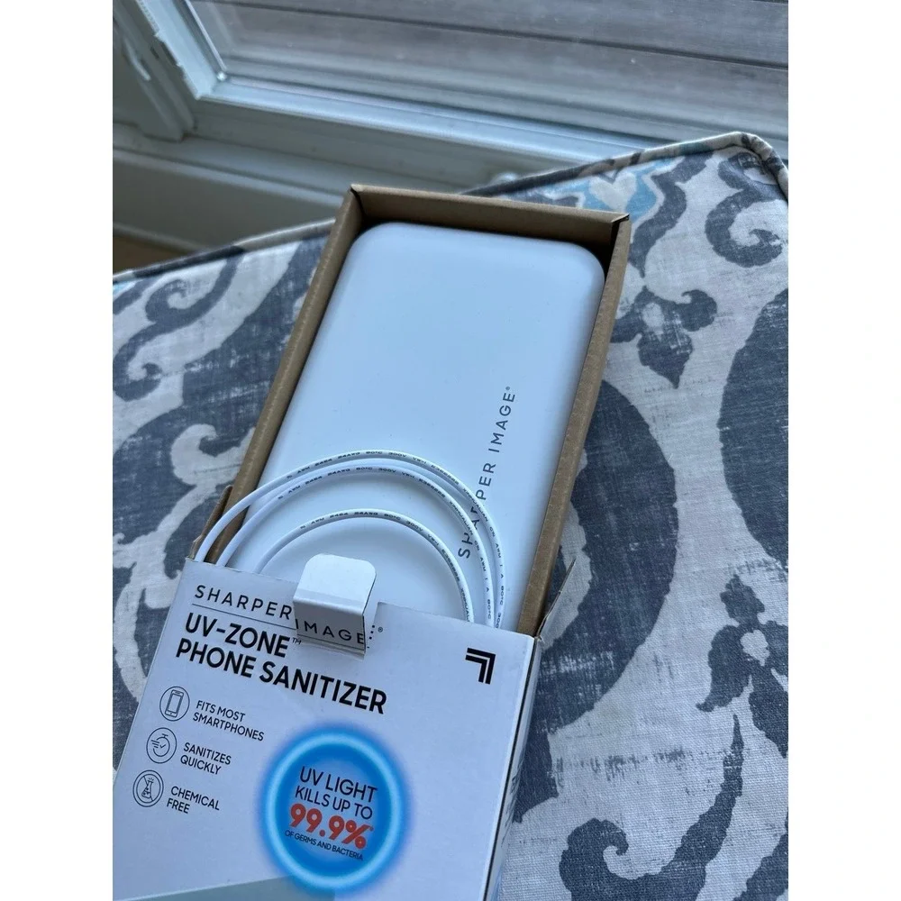 Sharper Image UV-ZONE Phone Sanitizer in box